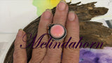 R65, pink conch ring size 9 1/2