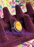 Size 7 is aw orange spiny ring