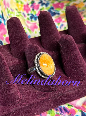 Size 7 is aw orange spiny ring