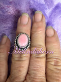 R101, pink conch ring size 7 1/2