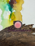 R65, pink conch ring size 9 1/2