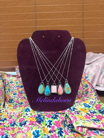 Decider Slider necklaces