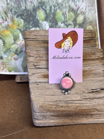 R39, Pink conch ring