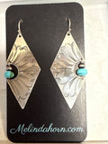Diamond cut out earrings