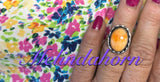 Size 7 is aw orange spiny ring