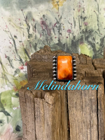 R83, orange spiny ring