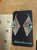 Diamond cut out earrings