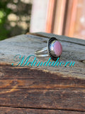 R120, size 8 1/2, pink conch ring