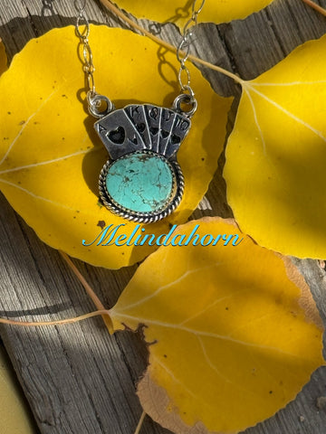 Card hand turquoise neck