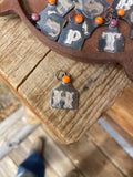 Cowtag necklace w/ orange spiny oyster in