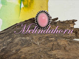R101, pink conch ring size 7 1/2