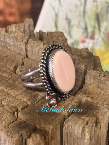 R80, pink conch ring