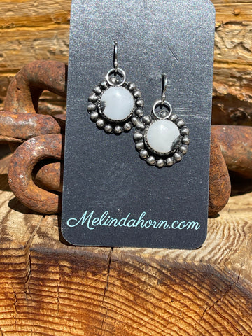 White Buffalo round earrings