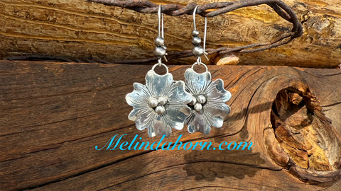 1 1/4” western flower earrings