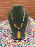 Orange spiny necklace and pendant