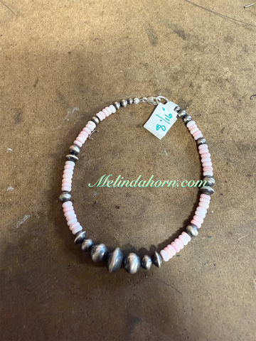 Pink conch and sterling beads